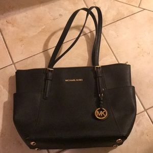 Black michael Kors jet set handbag